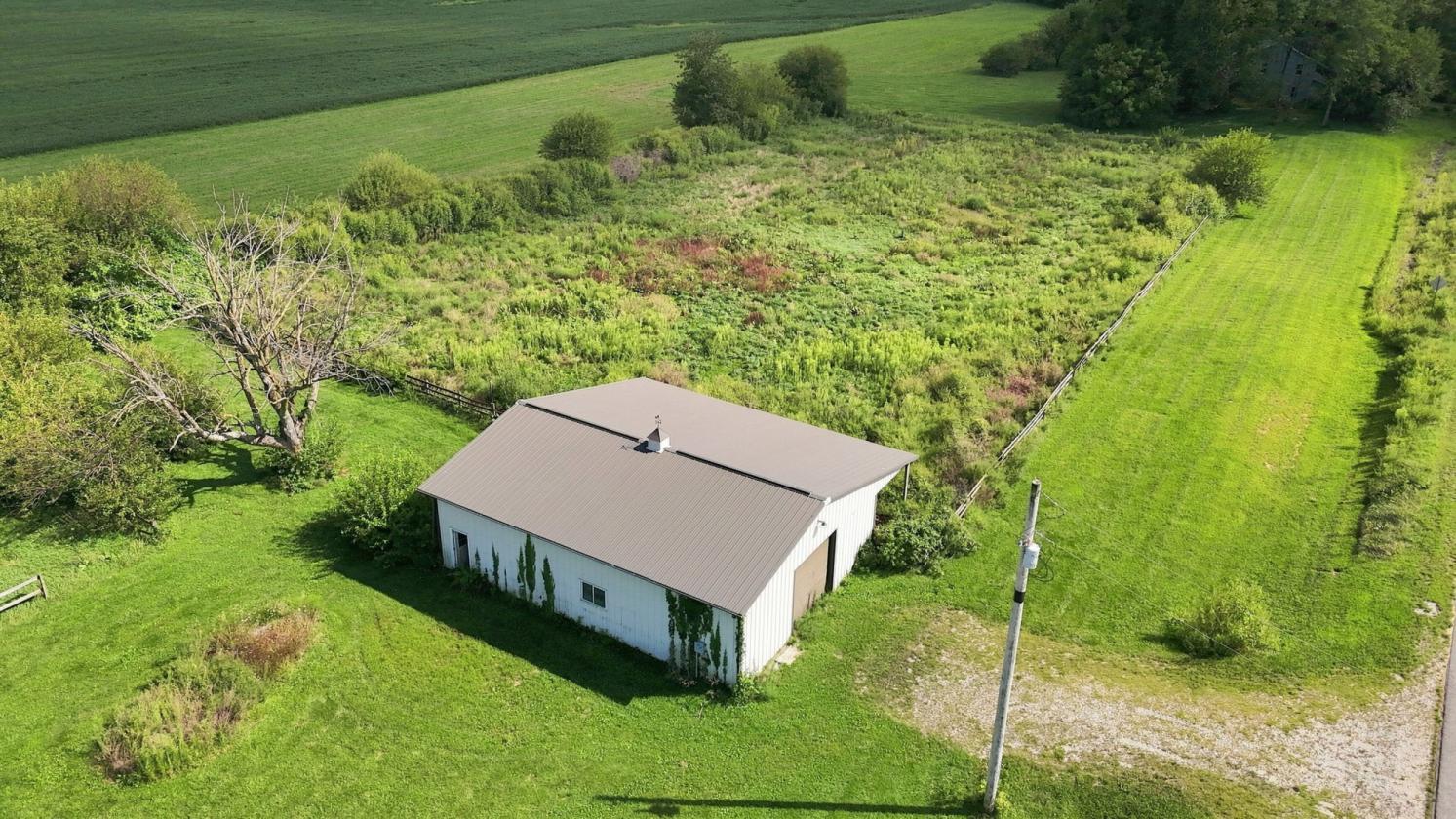 21.49 acres w/ move-in ready home & horse barn - photo 25