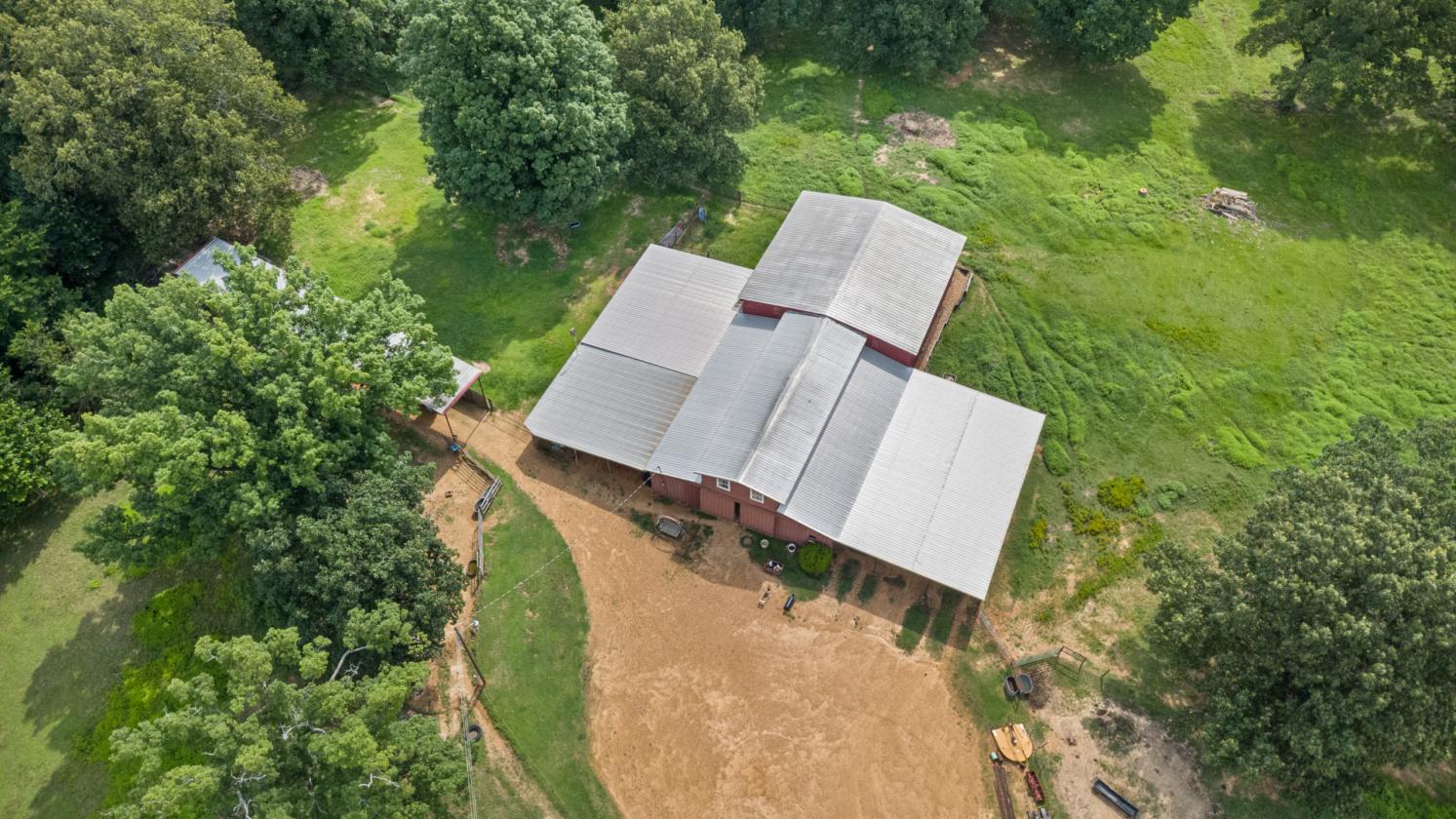 41-ACRE HORSE PROPERTY | 11 STALL BARN & ARENA - photo 21