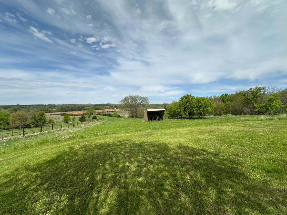 40 acre farm with stunning hilltop views! - photo 24