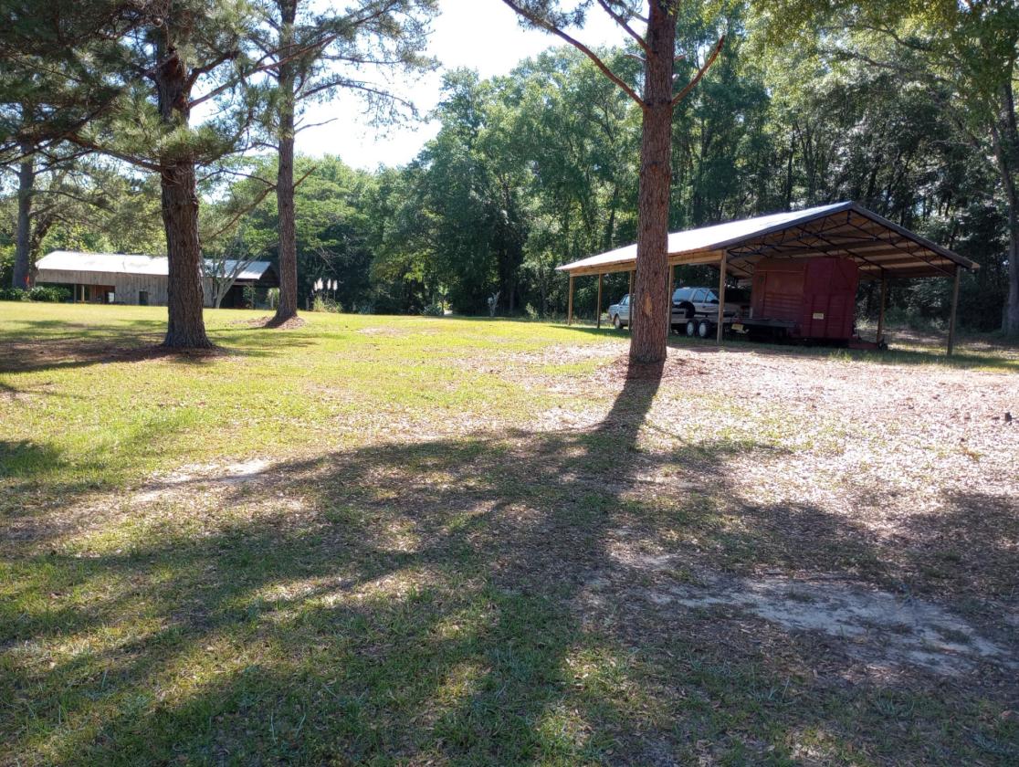 6+ Acres on Golf Course, 2 Barns, 1 House, NO HOA - photo 1