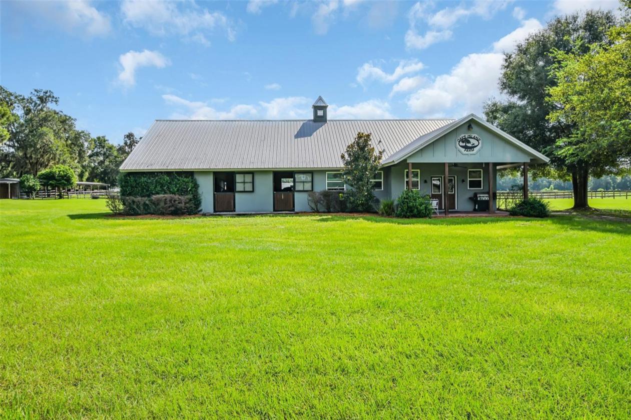 10.58-Acre Horse Farm with a 7 Stall Block Barn! - photo 1