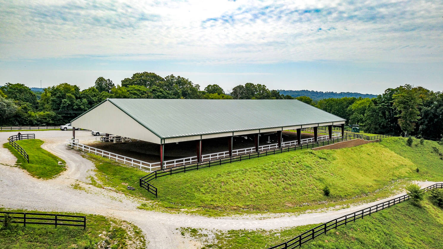15 acre farm with 20,000 SF covered arena, 15 stall... Lenoir City