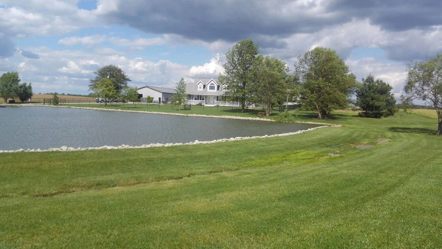 NEW PRICE! 2story LakeFront Home on Beautifully Maintained Horse Farm