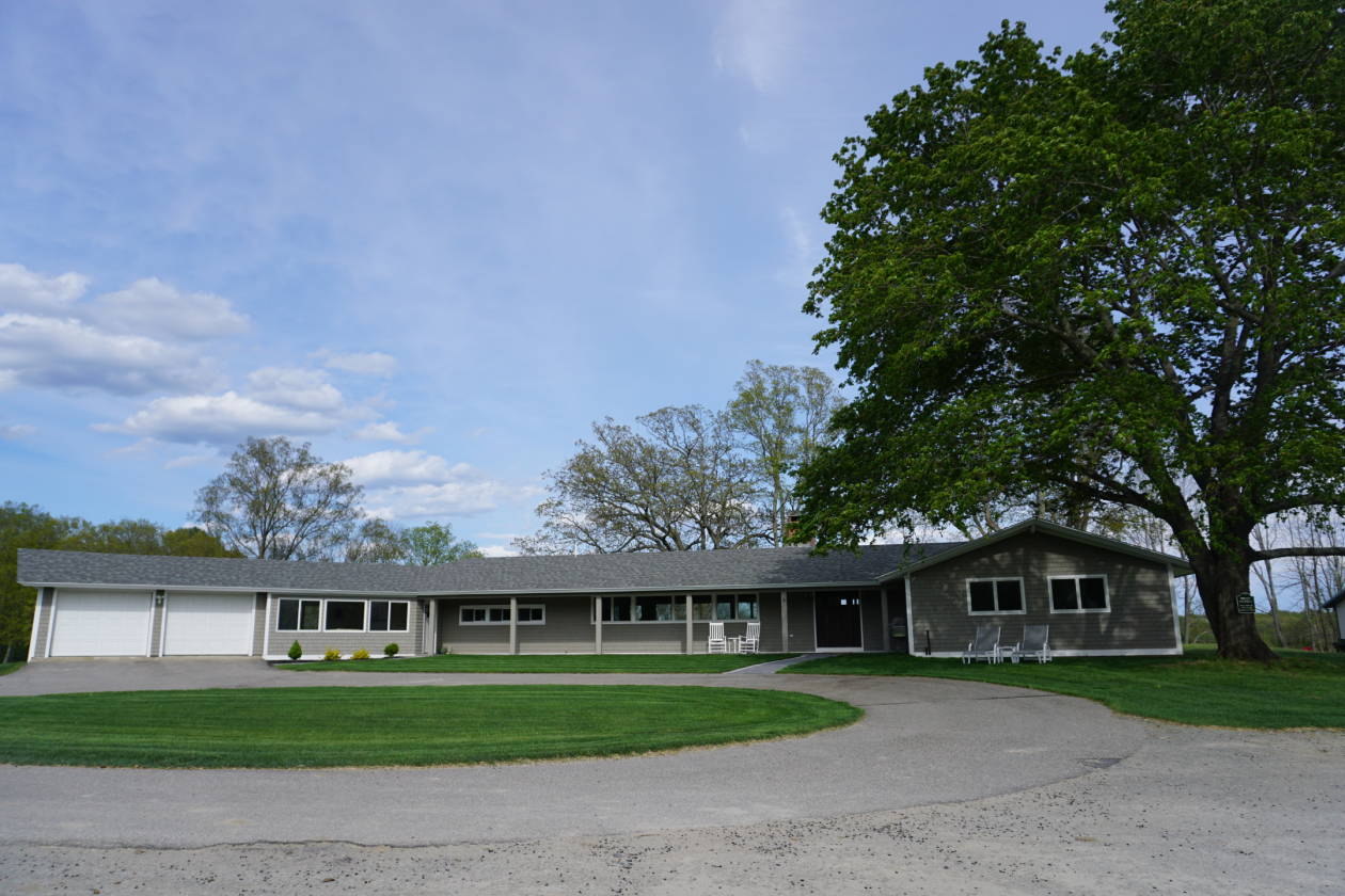 Luxury equestrian facility with remodeled home on a spectacular 21