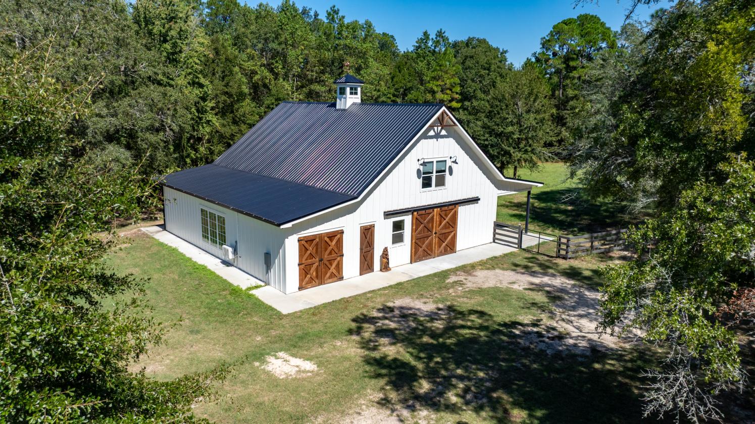 Modern Farmhouse with 3 Stall Barn on 20 Acres - photo 2