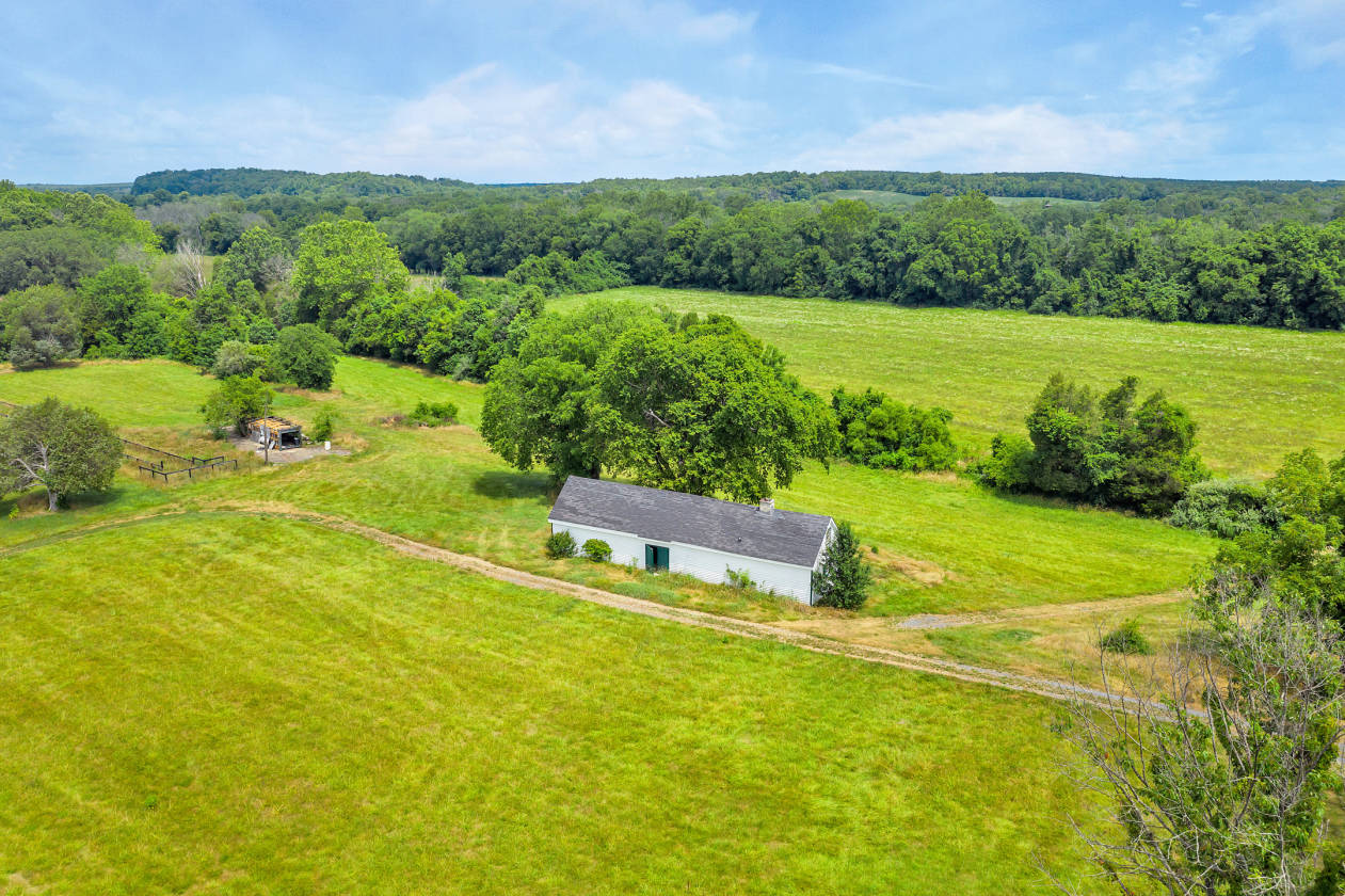 Wonderful Riverfront property with pasture and barn on over 50