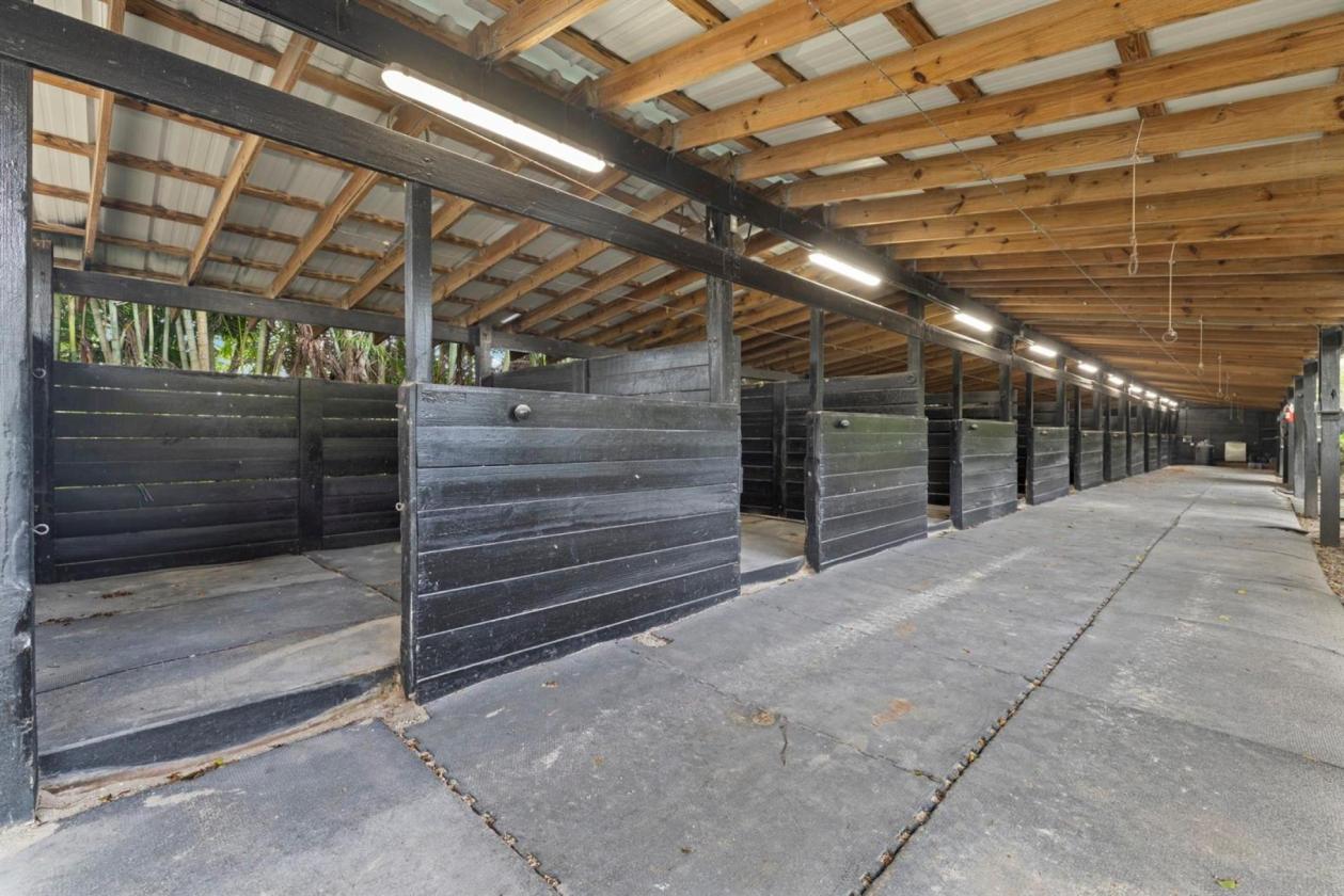 Horse Farm 11 Acres w/ 50 Stalls + groom cottages - photo 17
