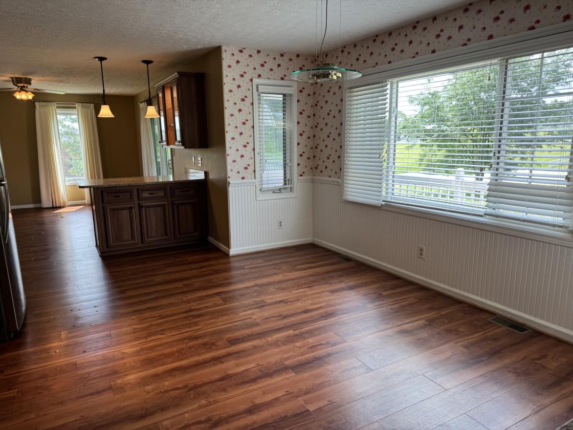 Beautiful home with Barn & Pond and fenced acreage - photo 7