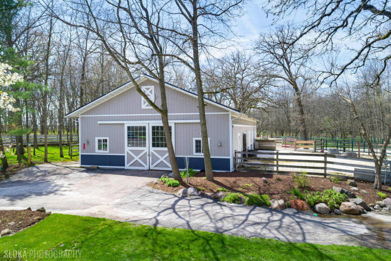 Stunning hobby farm with exquisite custom home, immaculate barn, and