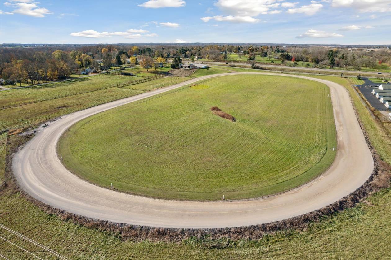 60 Acre Horse Farm with 1/2 Mile Track & 35 Stalls - photo 4
