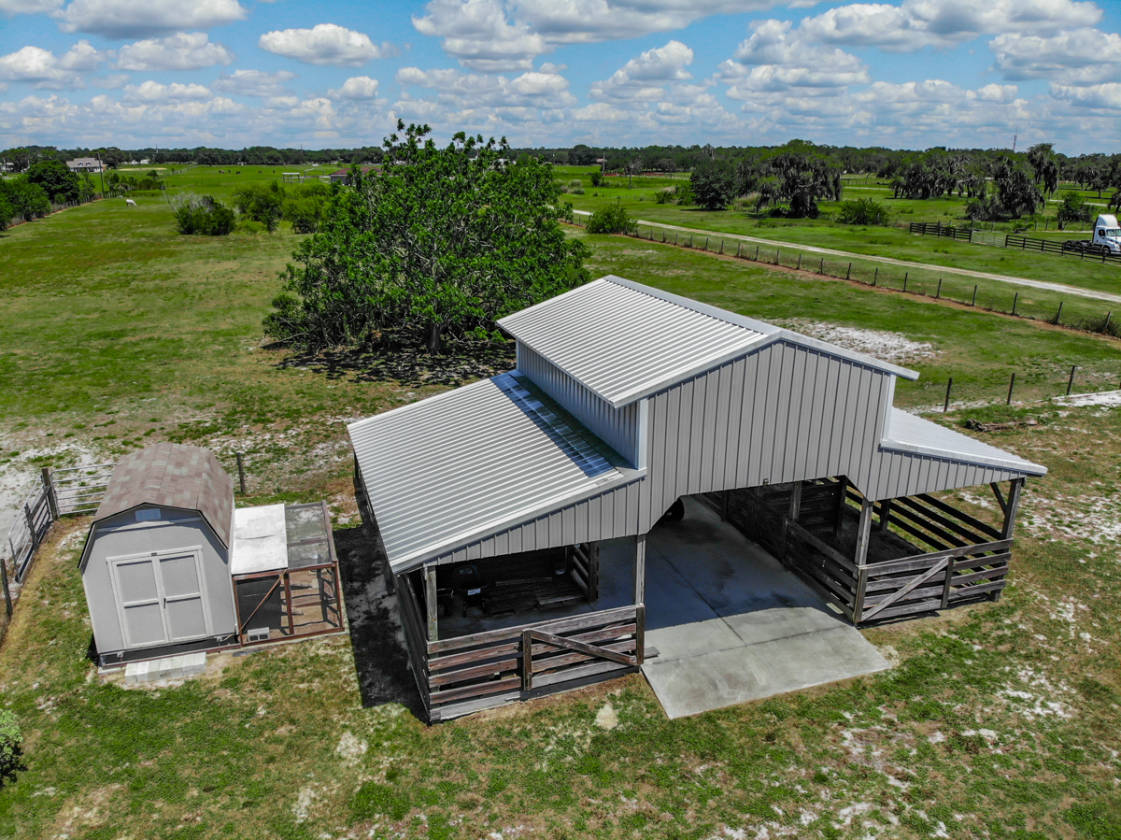 CUSTOM BUILT POOL HOME WITH TWO PADDOCKS, STABLES ON 6.63... Winter