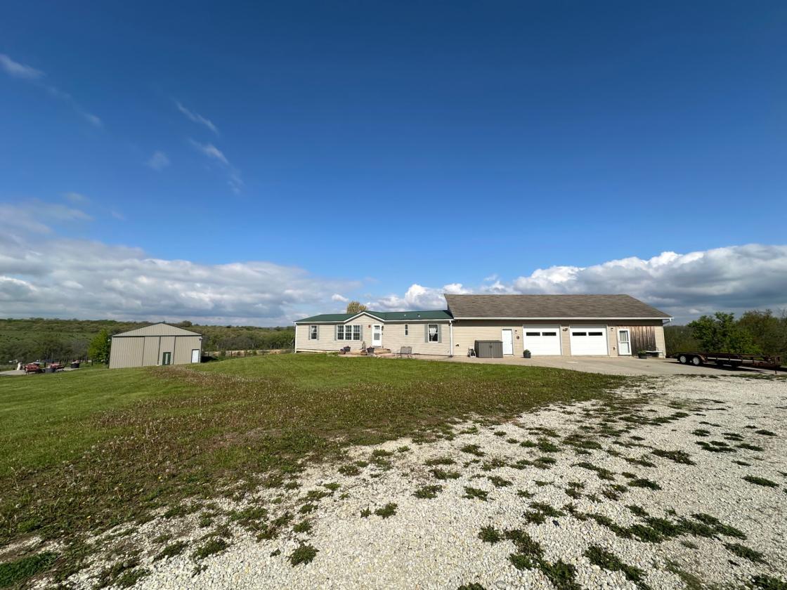 40 acre farm with stunning hilltop views! - photo 1