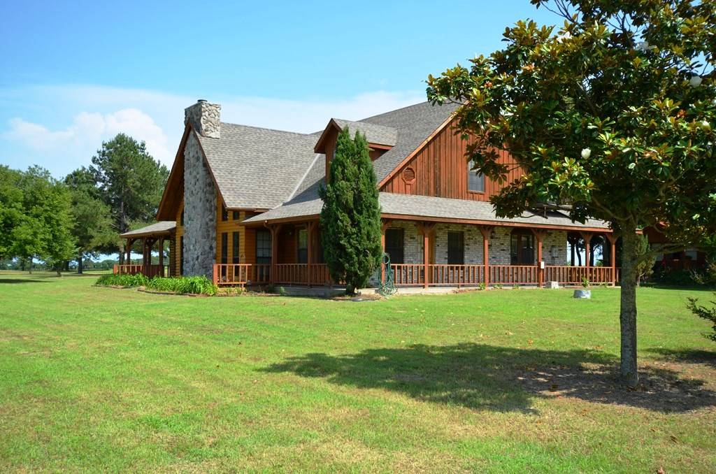 Beautiful TwoStory Log+Brick Home on 11 Acres of Lush Pastures