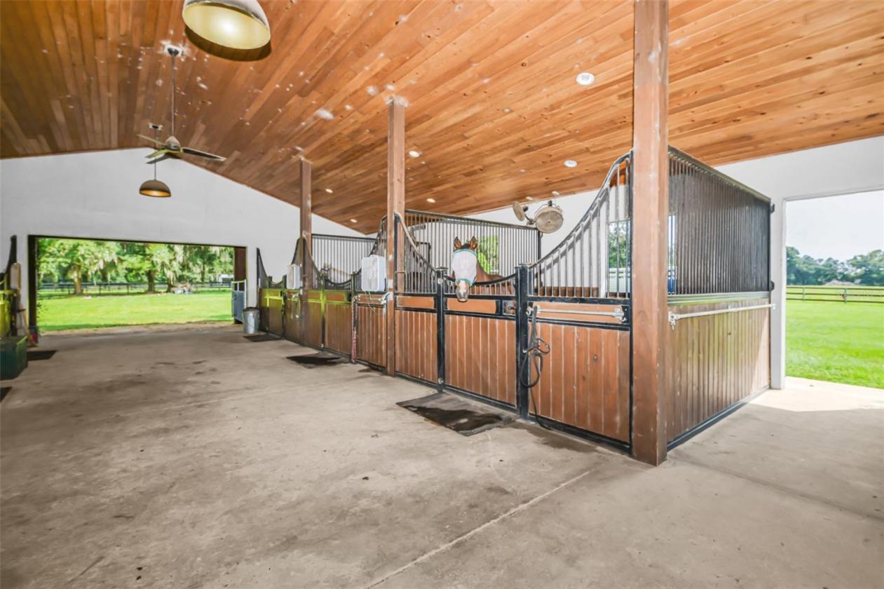 10.58-Acre Horse Farm with a 7 Stall Block Barn! - photo 9