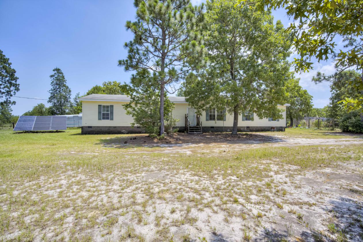 21.65 flat acres with large home and paddocks - photo 5