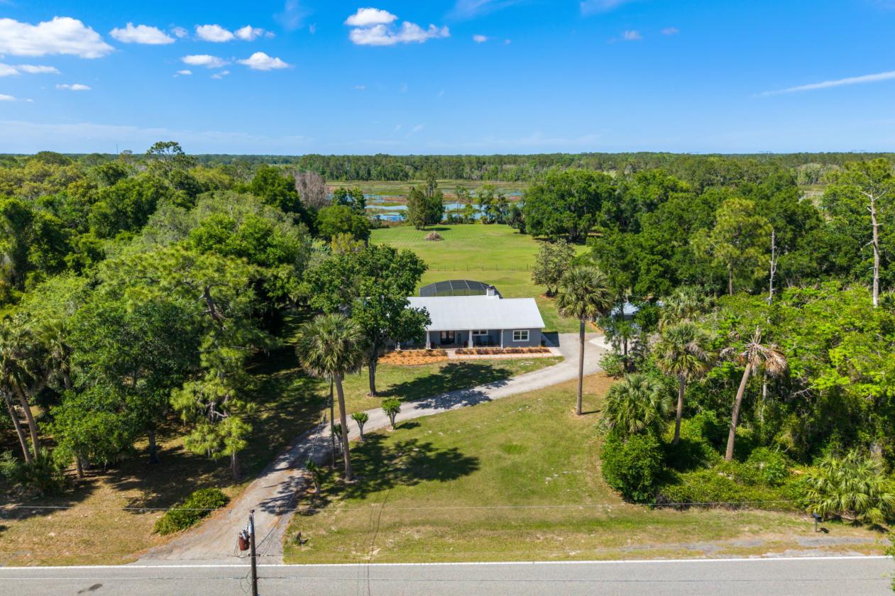 Lakefront Equestrian Estate: Pool, Barn & Pasture - photo 9