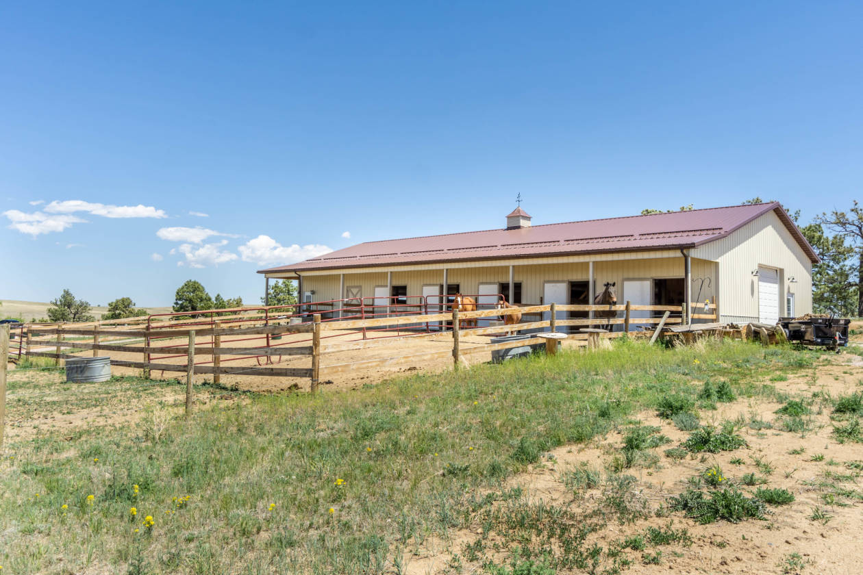70 Acre w/ Incredible Horse Barn, YearRound Pond Ramah, Elbert