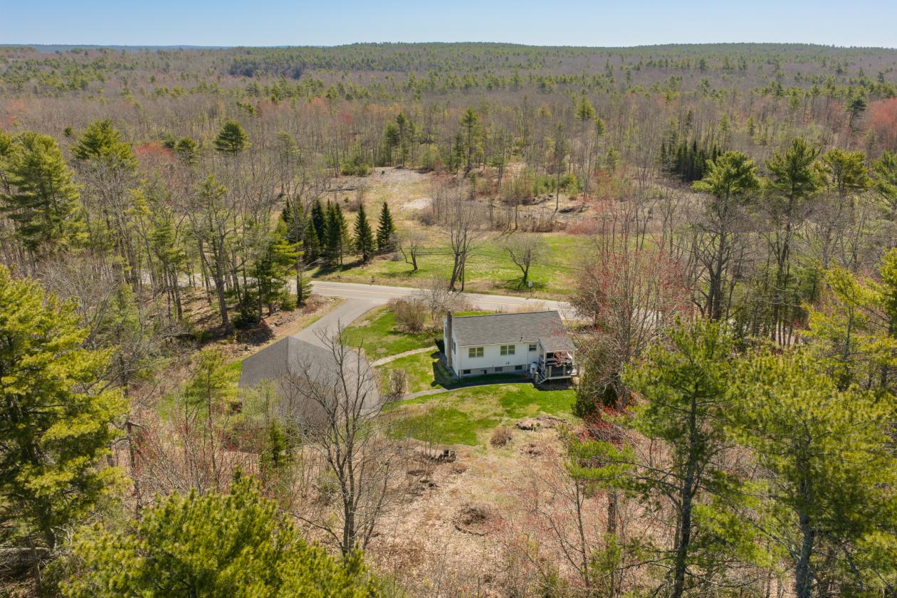 Split level ranch on 10 wooded acres in West Bath - photo 2