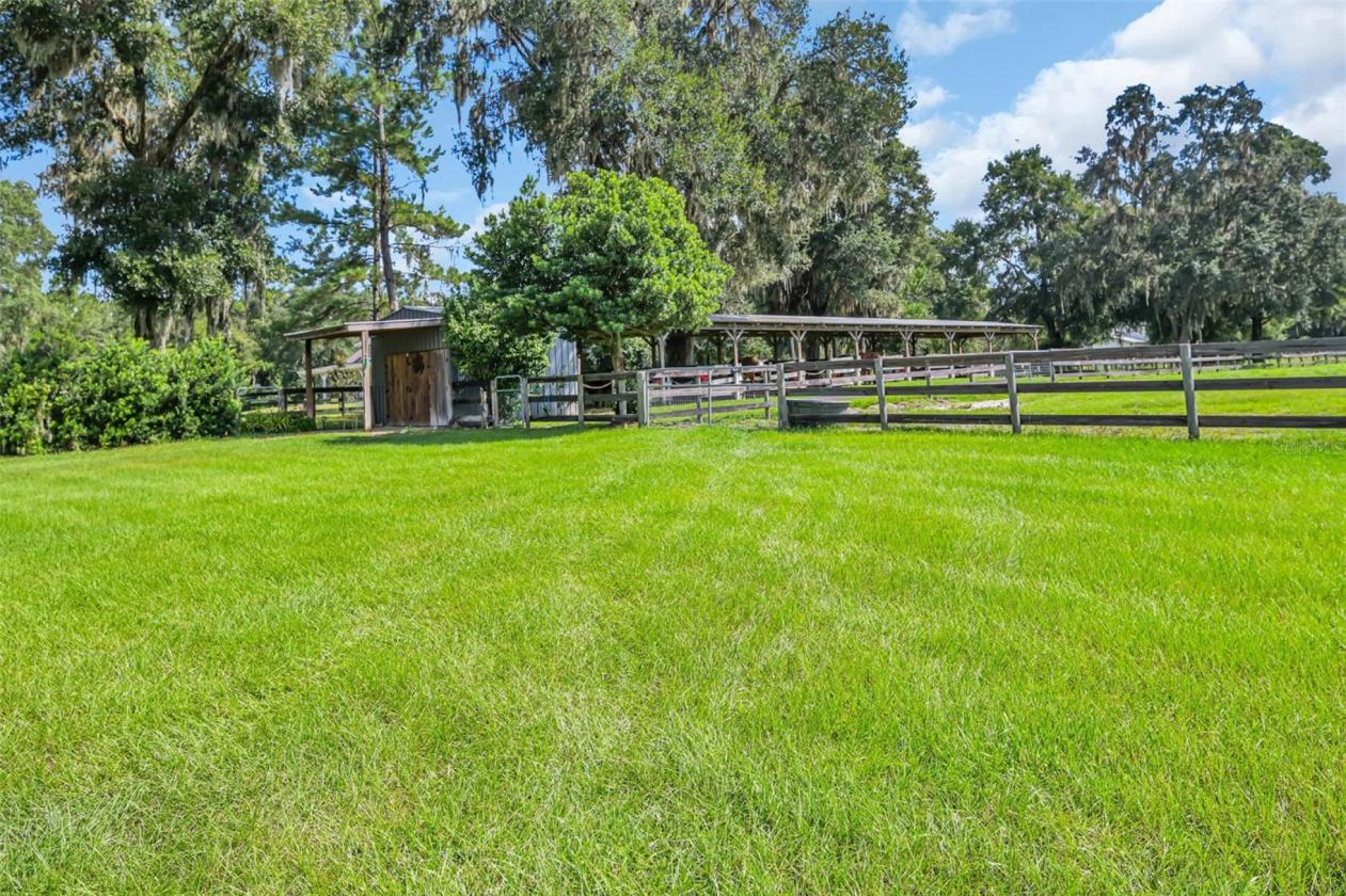 10.58-Acre Horse Farm with a 7 Stall Block Barn! - photo 15