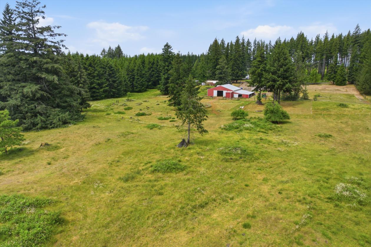 9.11 Acres with 8 Stall barn & Indoor Arena! - photo 29