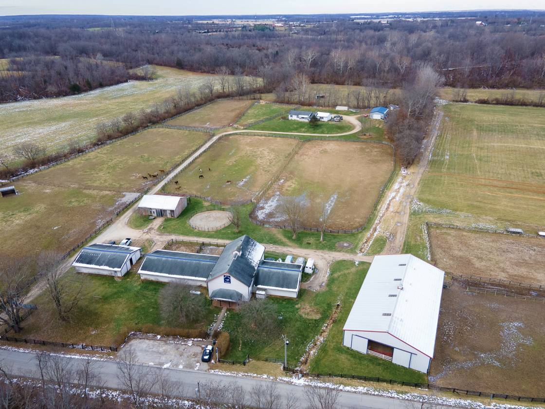 30 ACRE HORSE FACILITY - 30 STALLs + INDOOR + HOME - photo 1