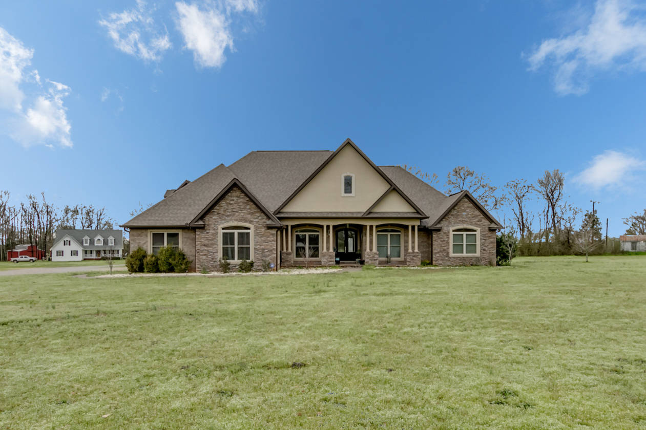 Beautiful, custom built home with a 40x60 shop on just... Moundville