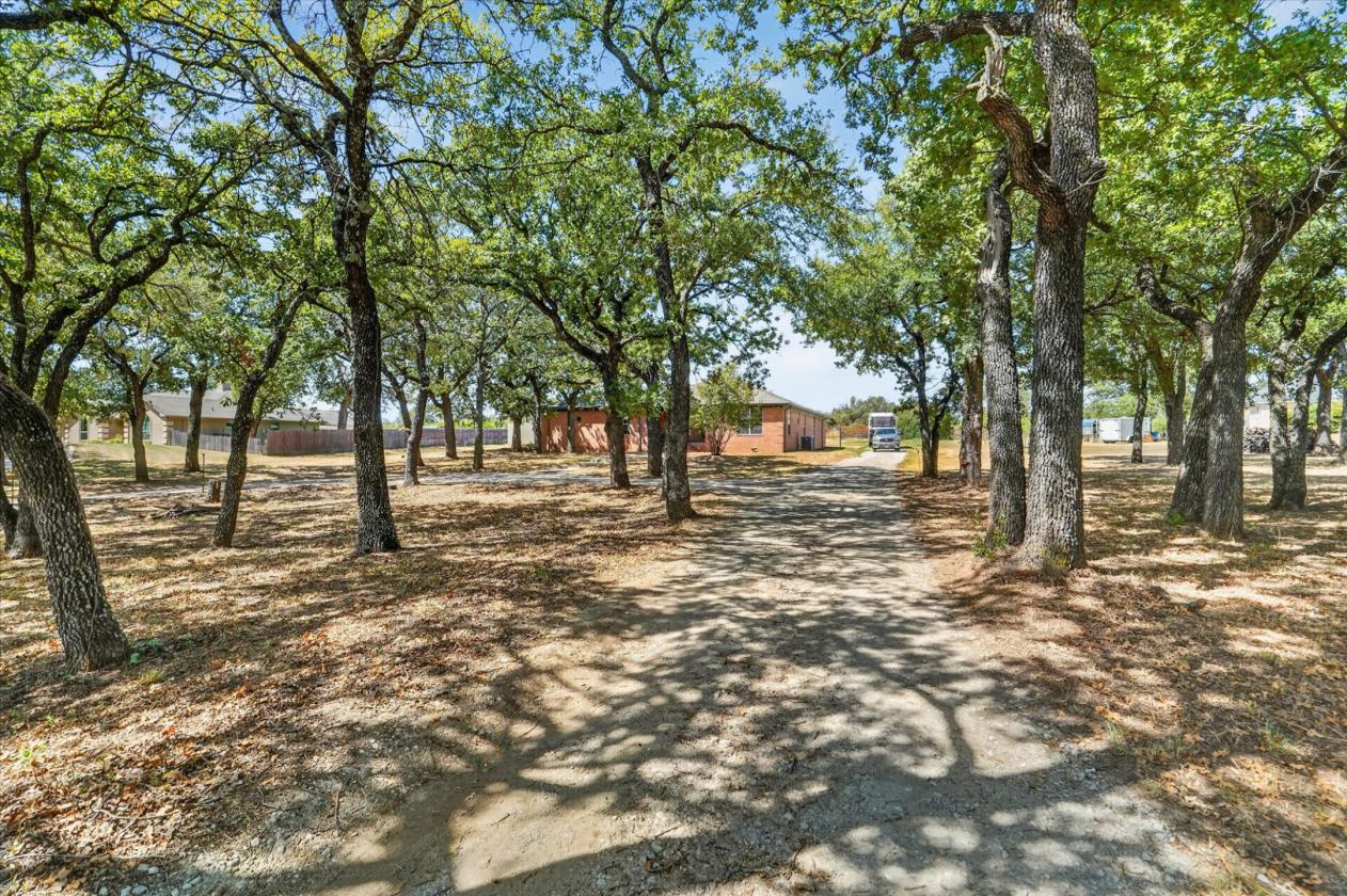 Brick Home on 2.36 Acres with Pool & 5-Stall+Tack Barn - photo 4