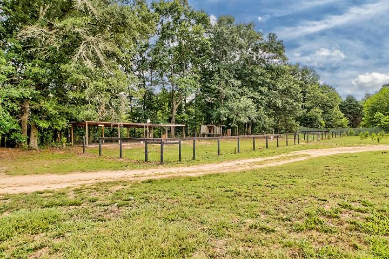 32.84 ACRES. EQUESTRIAN FACILITIES. - photo 6