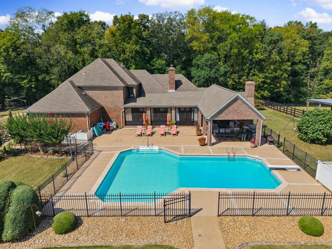 Executive-style home on 11+ acres in Elkmont, AL - photo 4