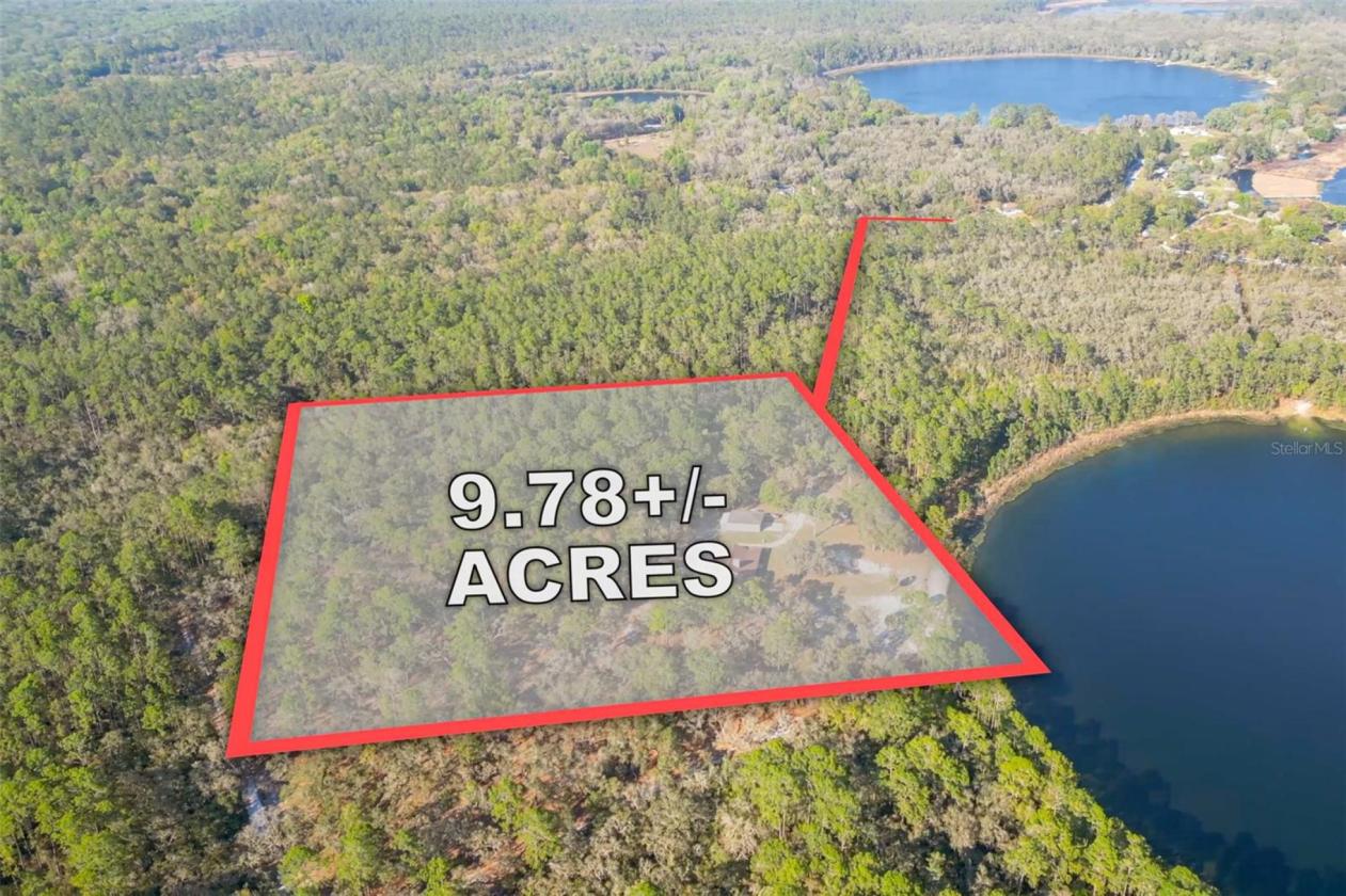 10 Acre Lakefront Estate w. 400k acre Trail Access - photo 3
