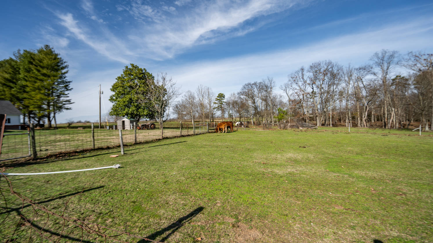Elegantly designed farmhouse featuring 37.40 acres +/ with barn