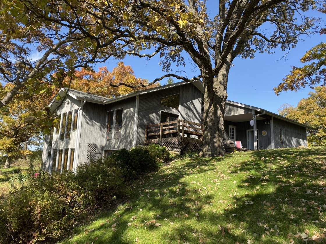 custom hillside ranch with 4 stall barn sits on rolling... Harvard