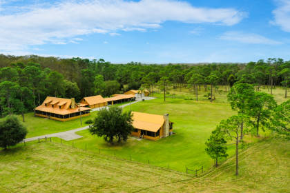 2 Log Cabin Homes on 48 +/- Pristine Acres | LaBelle ...