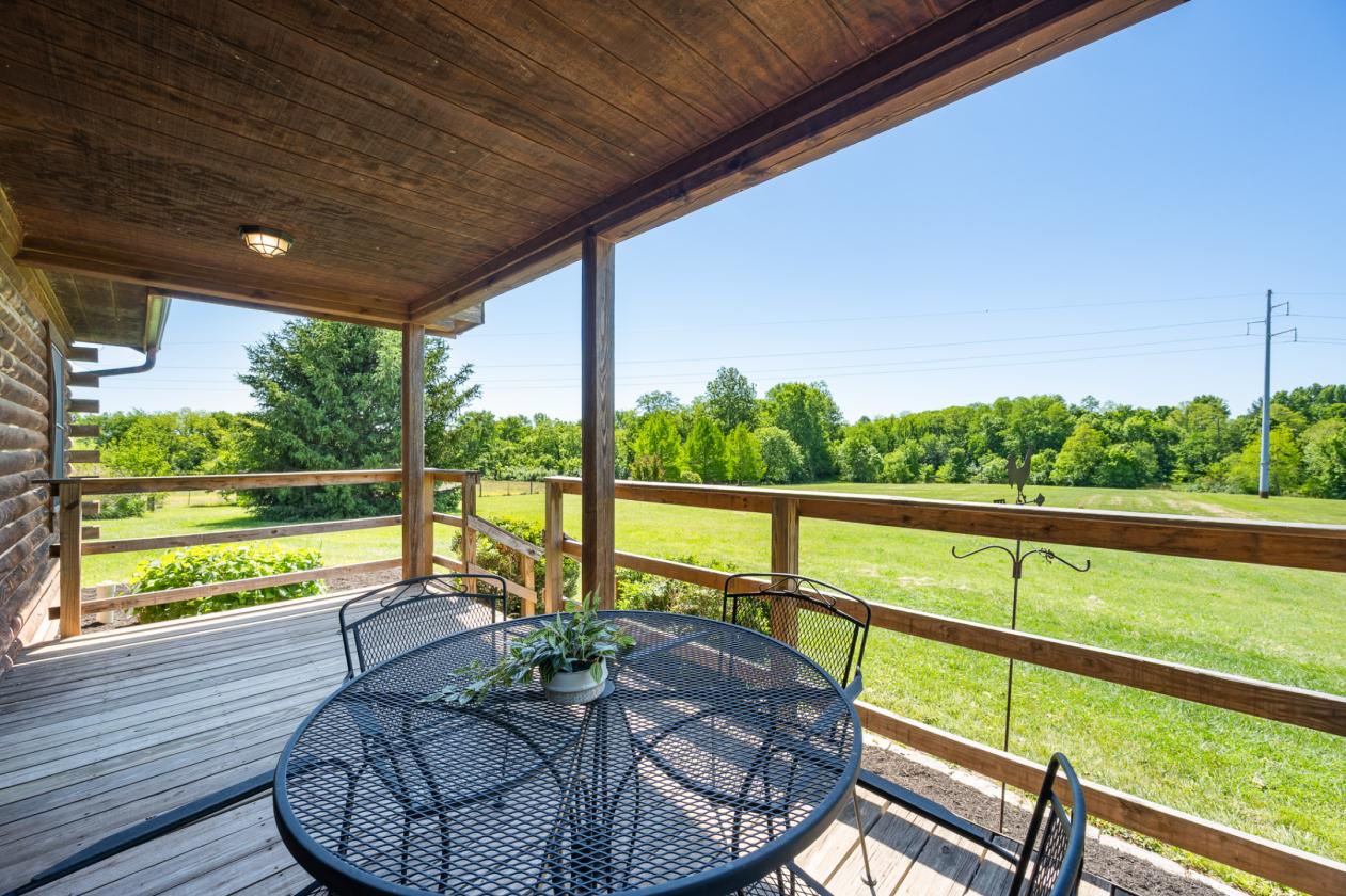 Log cabin nestled on 8.2 picturesque acres - photo 6