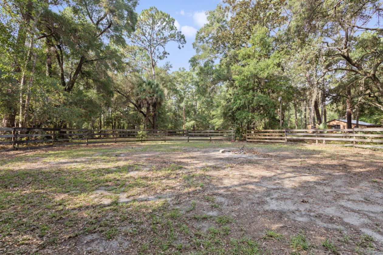 Luxury lake estate with acreage and horse stalls - photo 20