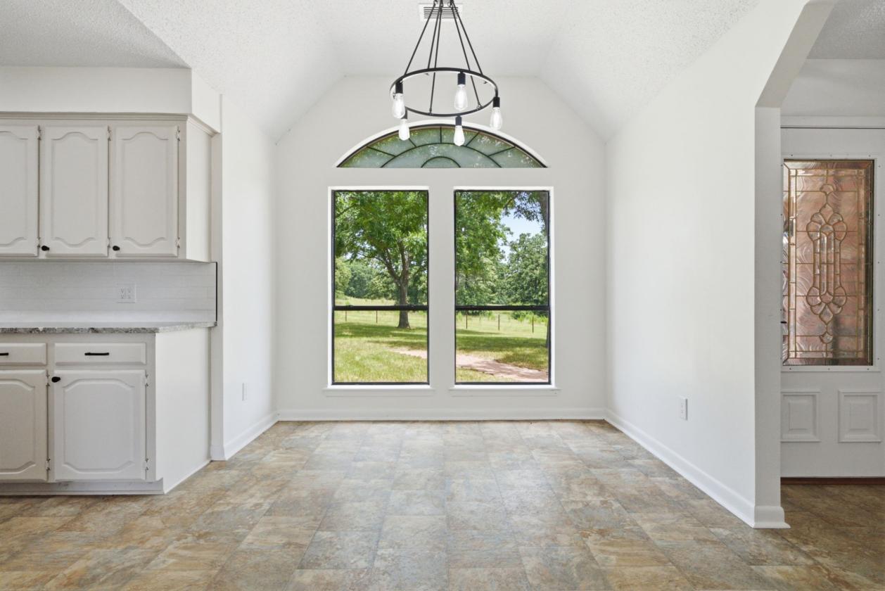~66 Acres + Updated Ranch Home + Ponds & Barn! - photo 6