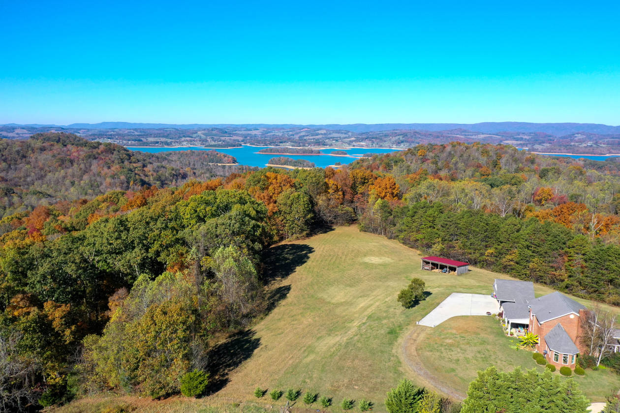Beautiful farm positioned perfectly between Douglas Lake and Smoky
