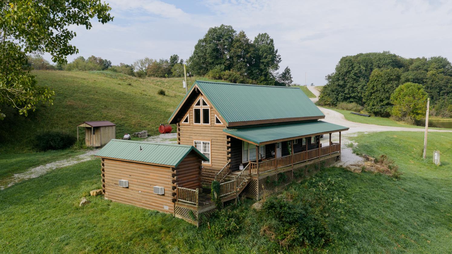 414 Acres, No Zoning, 24-Acre Lake, Hunting Cabin - photo 21