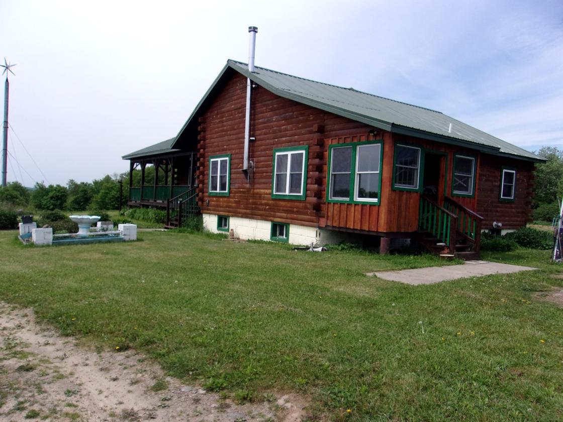 Log Home with 52 acres, barns, spectacular views - photo 17