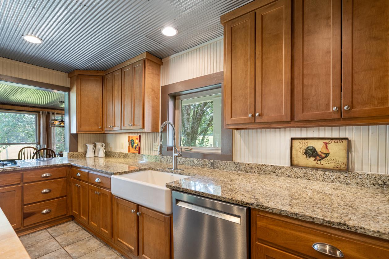 41-ACRE HORSE PROPERTY | 11 STALL BARN & ARENA - photo 11