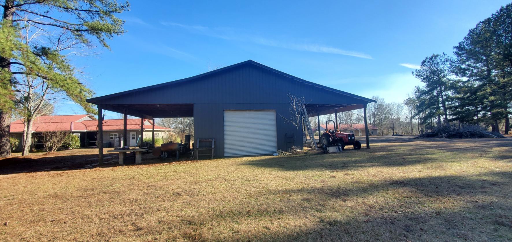 88.95 acres and 3 homes on this secluded property! - photo 26
