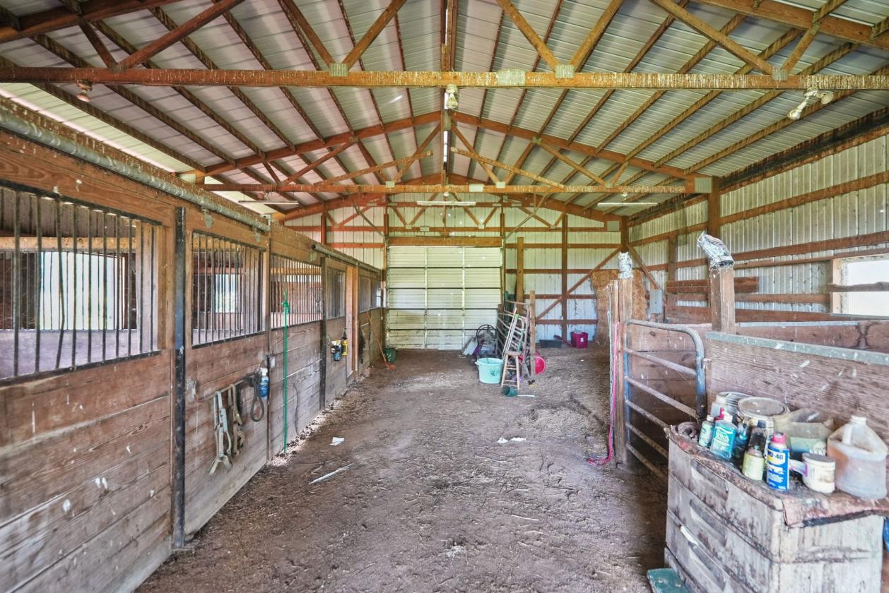 21.49 acres w/ move-in ready home & horse barn - photo 23