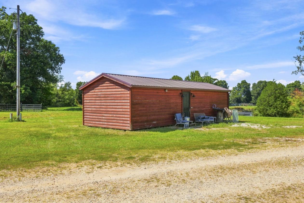 Multigenerational Home with 32 Acres & Horse Barn - photo 13
