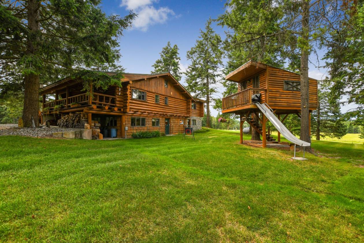 Breathtaking 22 acres in NW Montana with handcrafted cabin and