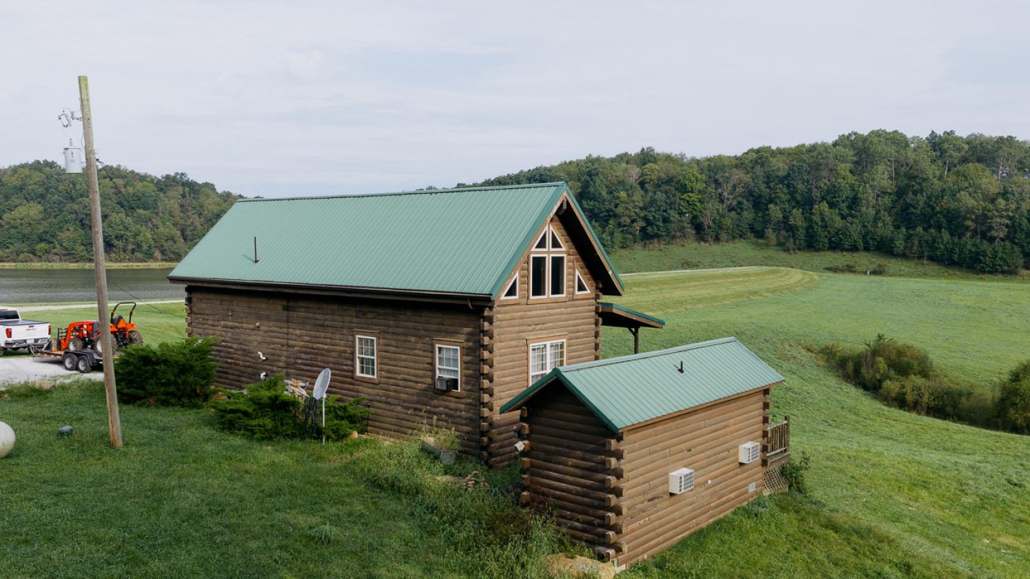 414 Acres, No Zoning, 24-Acre Lake, Hunting Cabin - photo 20