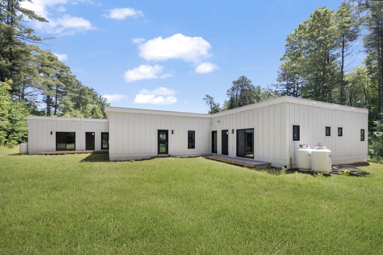 A Modern Retreat with Equestrian Potential! - photo 3