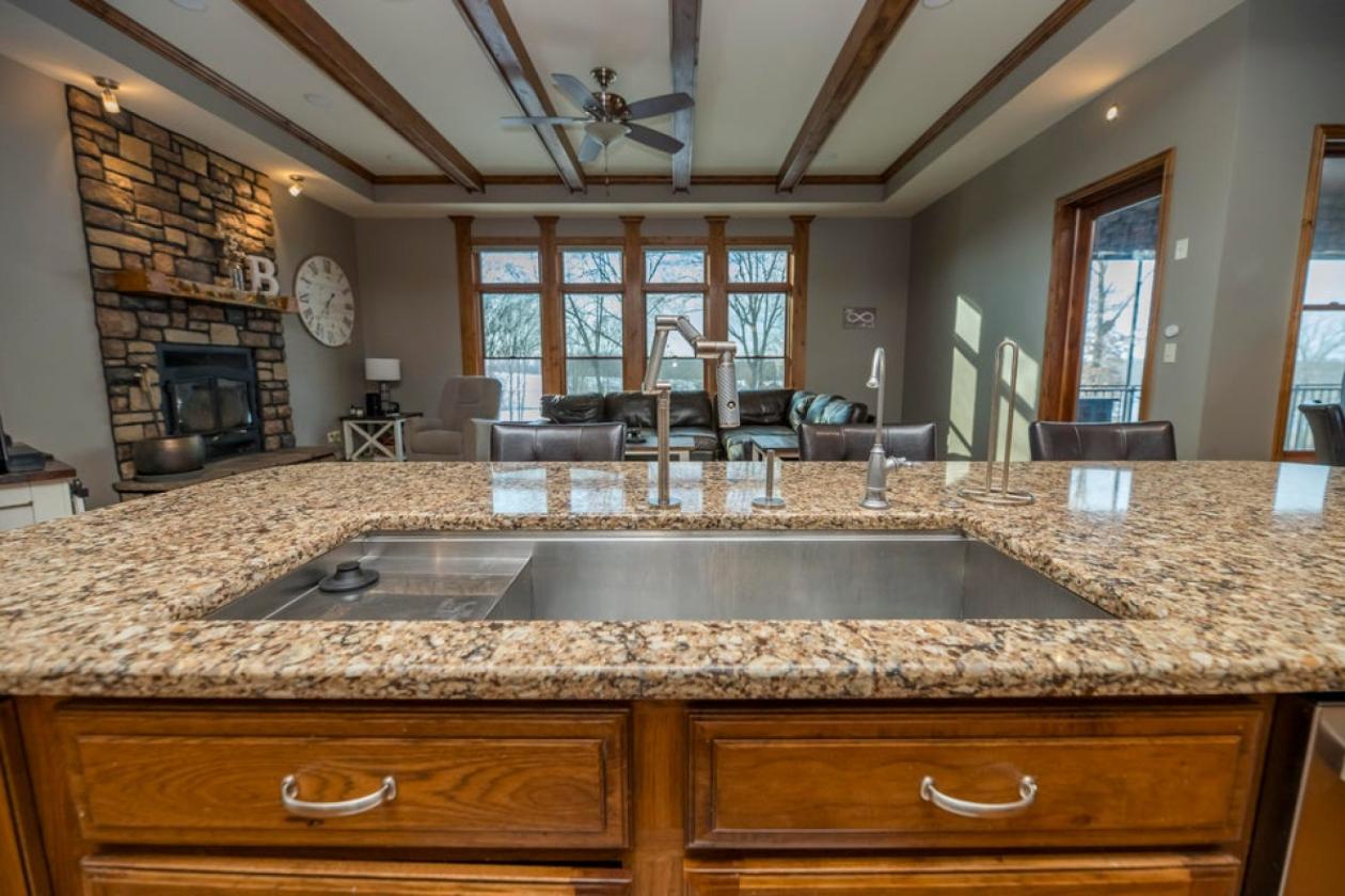 EXECUTIVE ESTATE , 30 A STOCKED LAKE AND OUT BLDG - photo 25