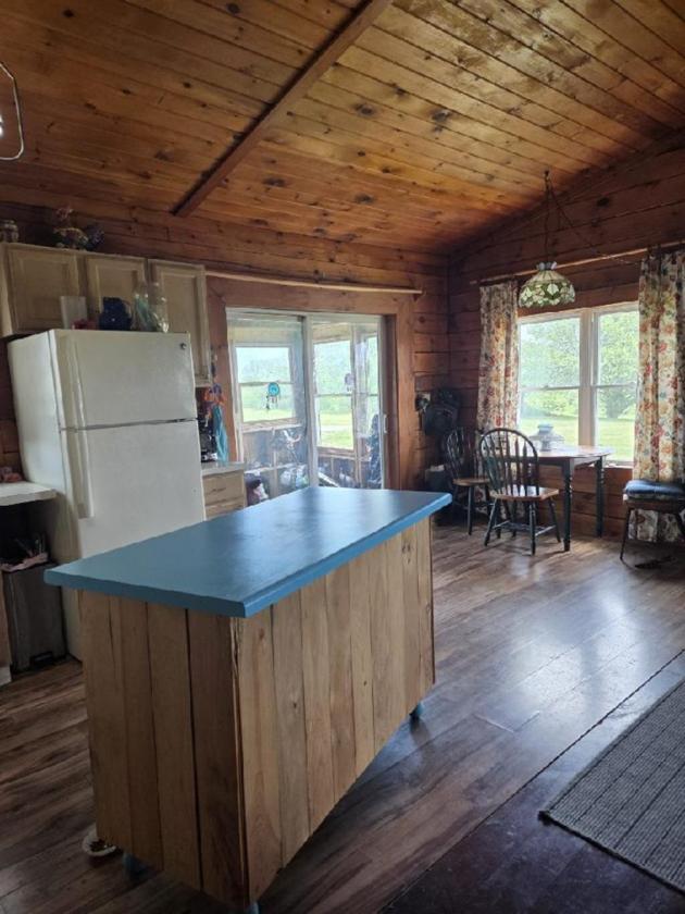 Log Home with 52 acres, barns, spectacular views - photo 19