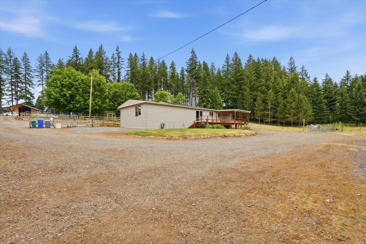 9.11 Acres with 8 Stall barn & Indoor Arena! - photo 18