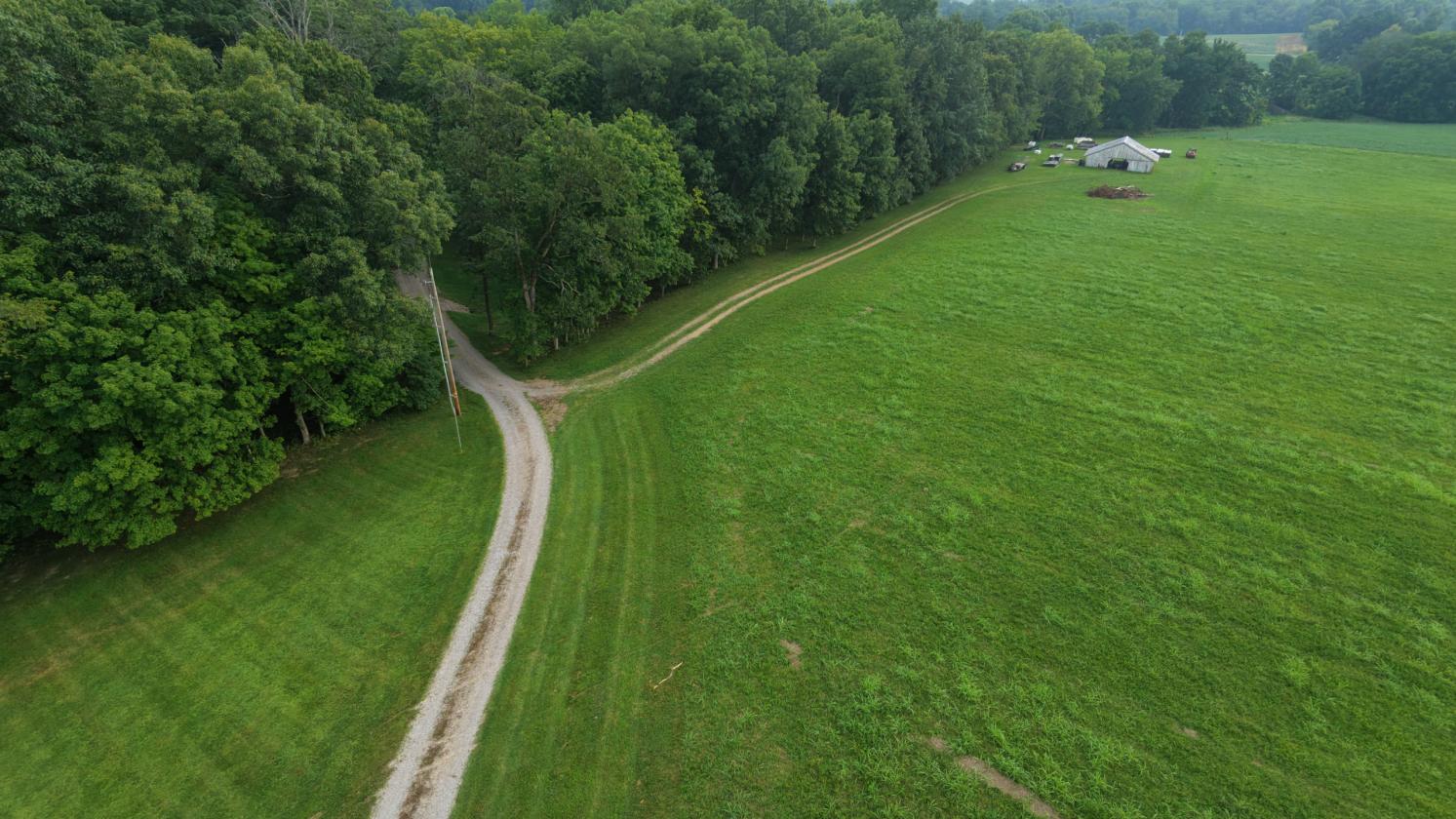 31 LEVEL ACRES w/HOME, BARN, 4 CAR GARAGE - photo 12